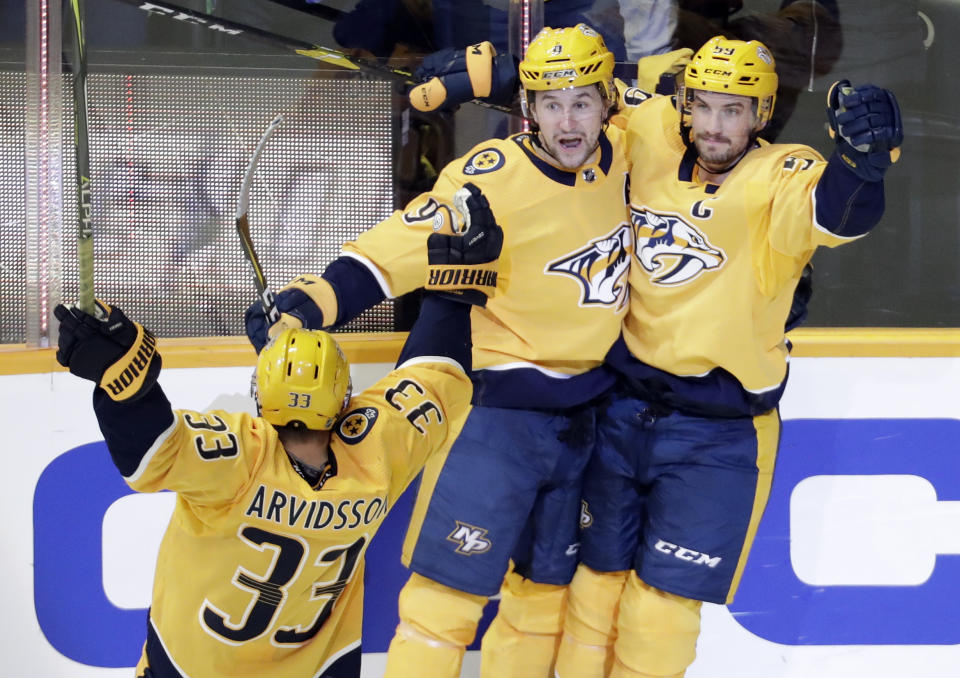 Nashville Predators left wing Filip Forsberg (9), of Sweden, celebrates after scoring a goal against the St. Louis Blues in the second period of an NHL hockey game Sunday, Feb. 10, 2019, in Nashville, Tenn. (AP Photo/Mark Humphrey)