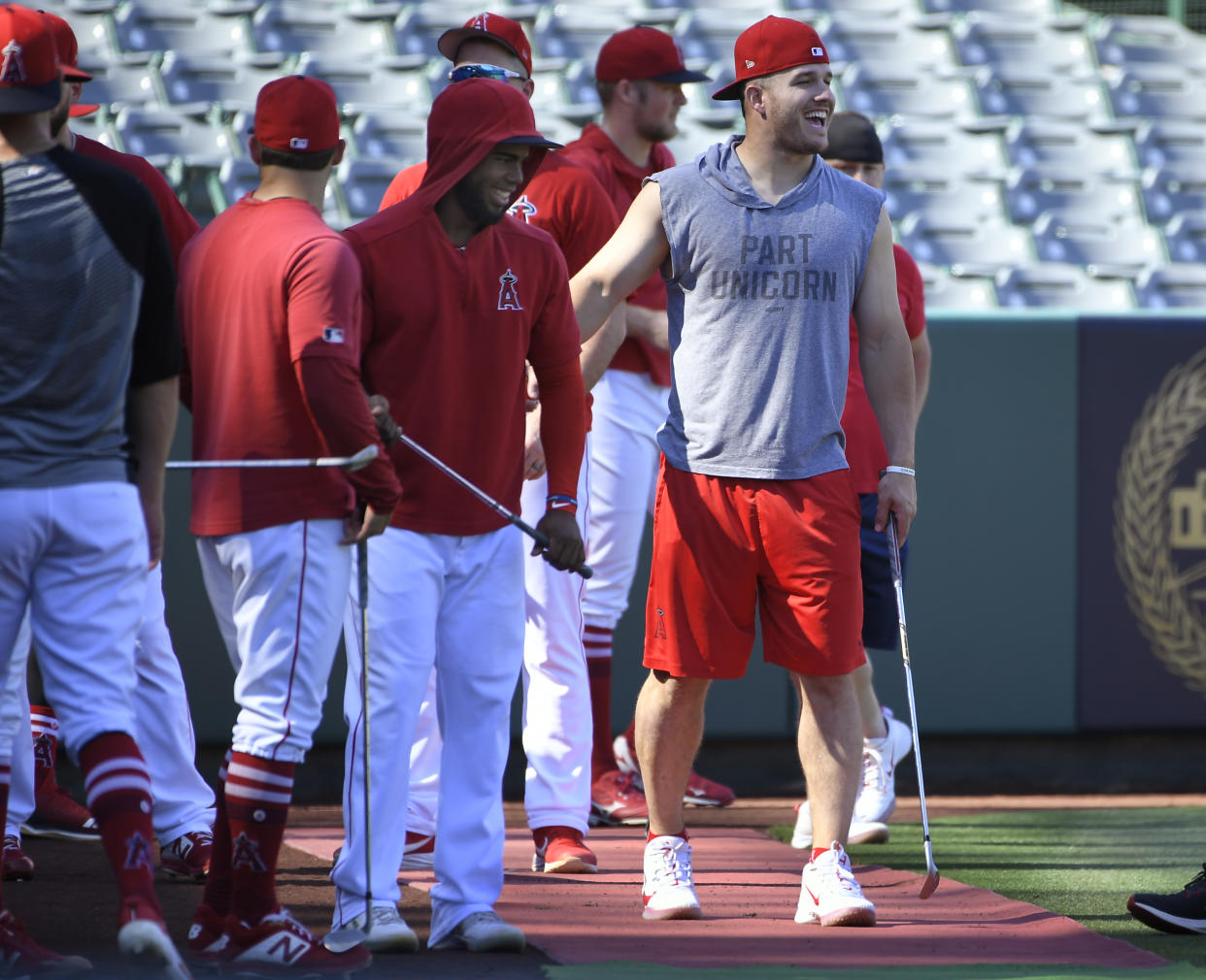 ANAHEIM, CA - JUNE 28: David Fletcher #6, Luis Rengifo #4 and Mike Trout #27 of the Los Angeles Angels of Anaheim gets ready to hit golf balls in left field before playing the Oakland Athletics at Angel Stadium of Anaheim on June 28, 2019 in Anaheim, California. (Photo by John McCoy/Getty Images)