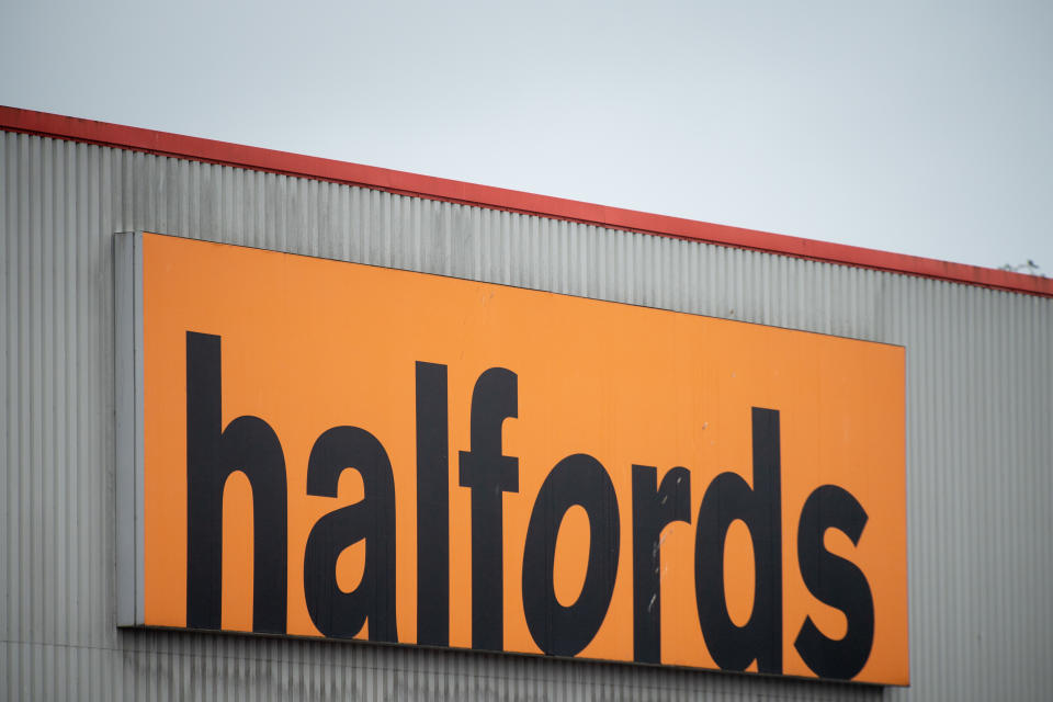 CARDIFF, WALES - JULY 27: A close-up of a Halfords store sign on July 27, 2020 in Cardiff, Wales. Many UK businesses are announcing job losses due to the effects of the coronavirus pandemic and lockdown. (Photo by Matthew Horwood/Getty Images)