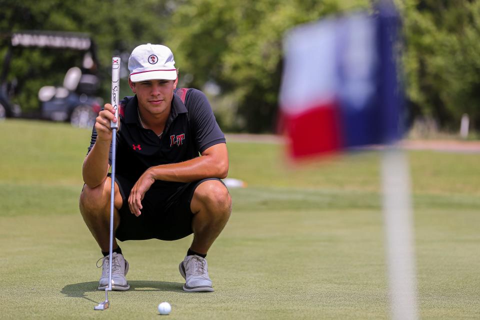 Lake Travis golfer Brian Comegys lines up a putt at the UIL Class 6A State Championship at Legacy Hills Golf Club in Georgetown on Monday. Comegys shot a 2-under 70 on the first day of competition and sits two shots back from the lead.