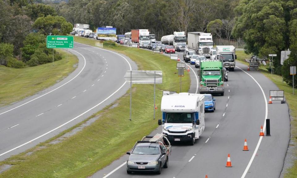 Motorists approaching a checkpoint at Coolangatta on the Queensland-New South Wales border, Friday, 7 August, 2020.