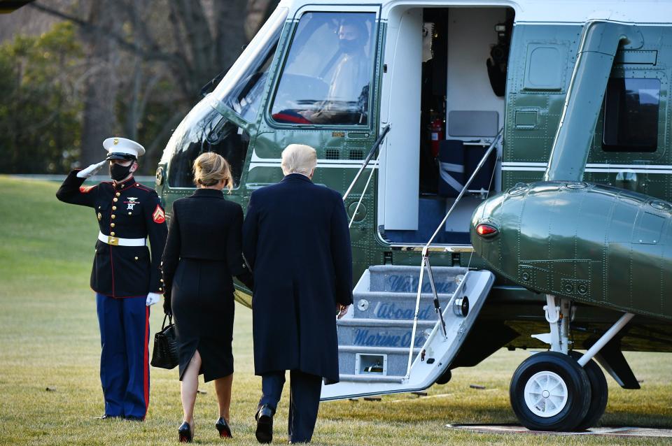 US President Donald Trump and First Lady Melania leave the White House January 2021 amid rumours