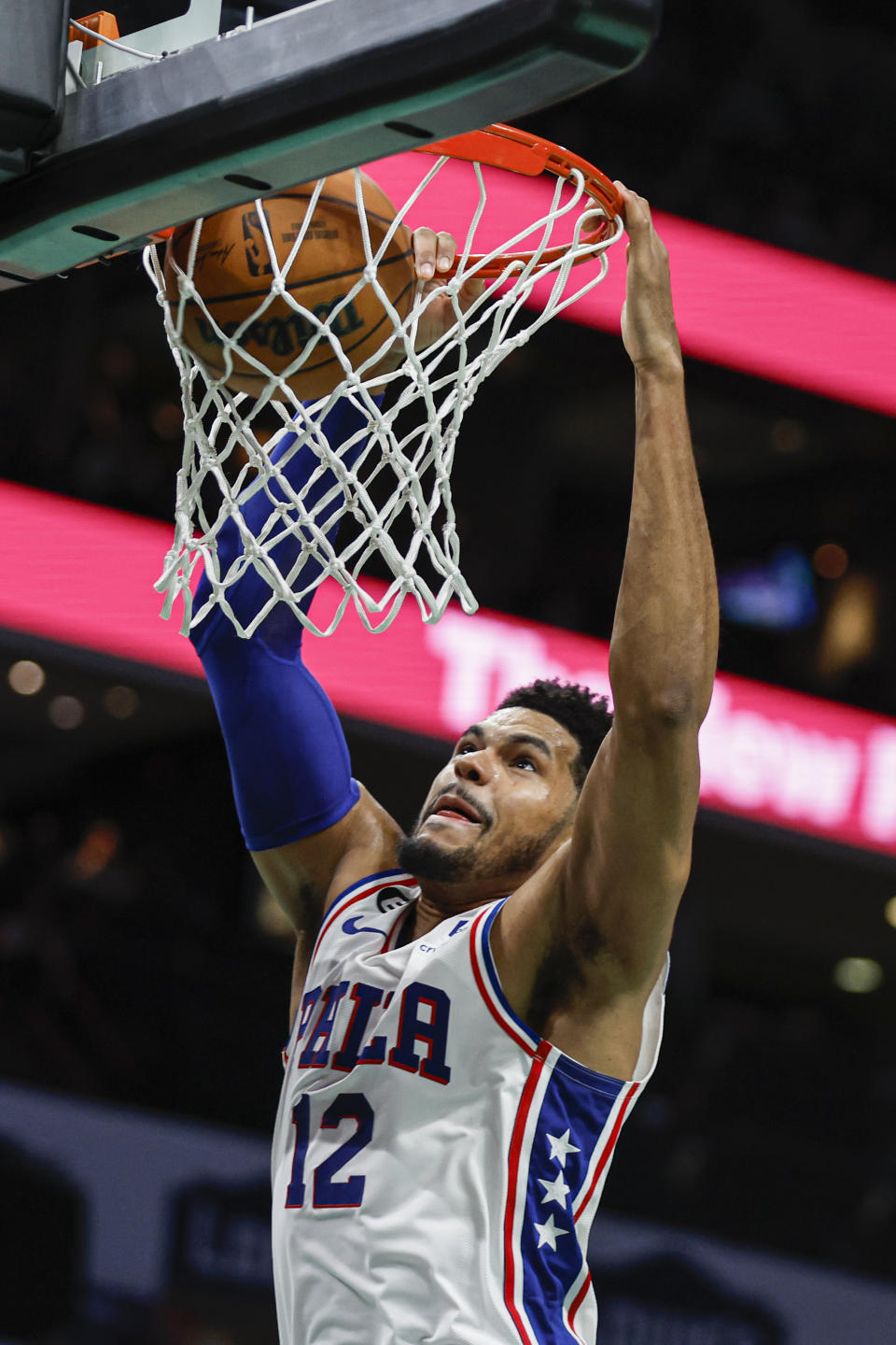 Philadelphia 76ers forward Tobias Harris dunks against the Charlotte Hornets during the second half of an NBA basketball game in Charlotte, N.C., Friday, March 17, 2023. (AP Photo/Nell Redmond)