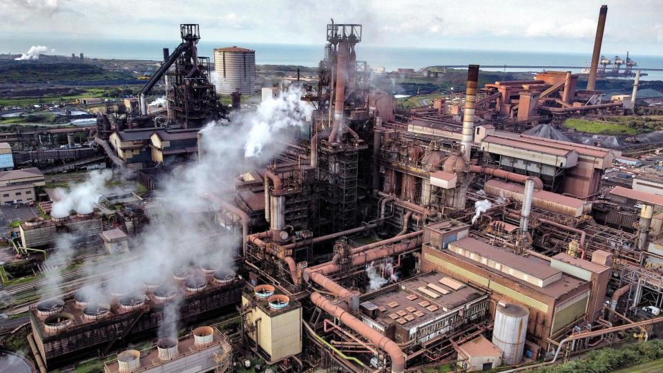 The Port Talbot steelworks with smoke rising from the furnaces