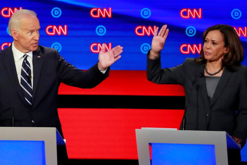 FILE PHOTO: Former Vice President Joe Biden and U.S. Senator Kamala Harris gesture on the second night of the second U.S. 2020 presidential Democratic candidates debate in Detroit, Michigan, U.S.
