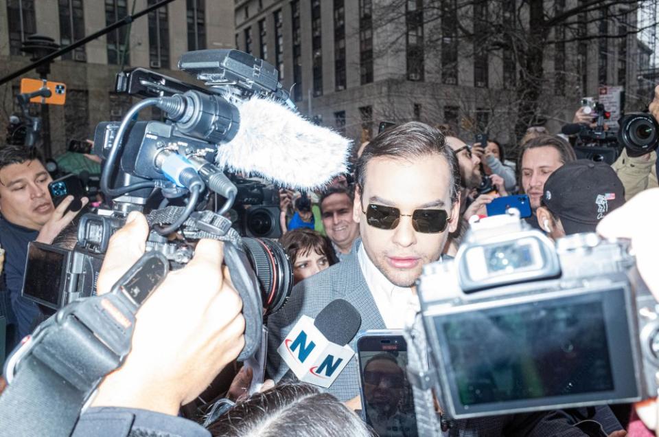 Rep. George Santos visits the scene outside of the Manhattan Courts during the Indictment trial of Donald Trump in New York City, on April 3.<span class="copyright">John Taggart—Redux</span>