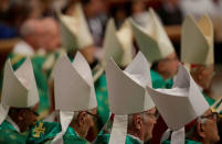 Cardinals and bishops attend a special mass to mark the new World Day of the Poor led by Pope Francis (not pictured) in Saint Peter's Basilica at the Vatican, November 19, 2017. REUTERS/Max Rossi