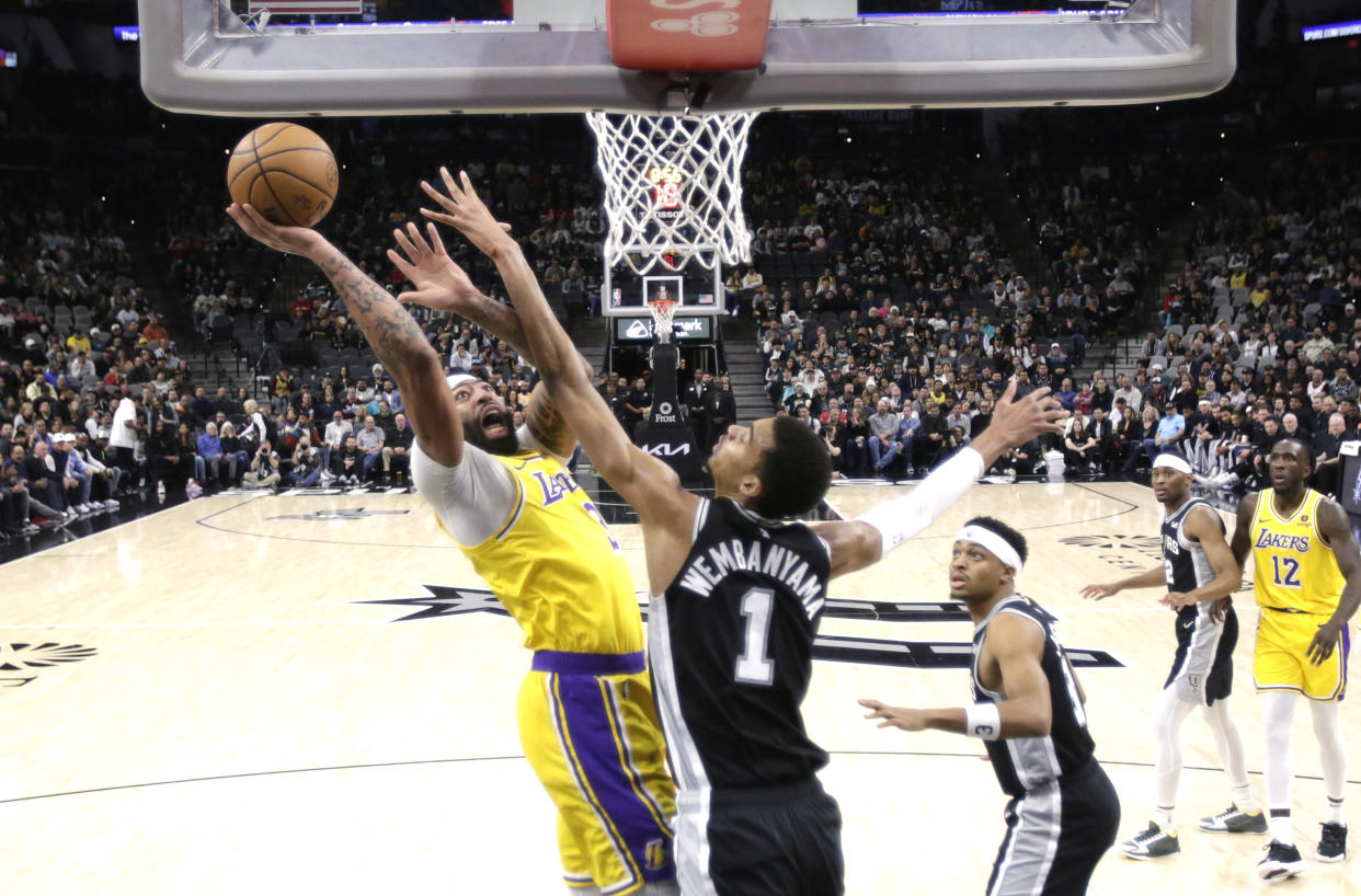 SAN ANTONIO, TX - DECEMBER 13:  Anthony Davis #3 of the Los Angeles Lakers shoots over Victor Wembanyama #1 of the San Antonio Spurs in the first half at Frost Bank Center on December  13, 2023 in San Antonio, Texas. NOTE TO USER: User expressly acknowledges and agrees that, by downloading and or using this photograph, User is consenting to terms and conditions of the Getty Images License Agreement. (Photo by Ronald Cortes/Getty Images)