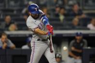 Texas Rangers' Isiah Kiner-Falefa hits an RBI-double during the fifth inning of a baseball game against the New York Yankees, Monday, Sept. 20, 2021, in New York. (AP Photo/Frank Franklin II)