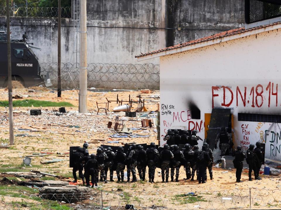 Riot police during an uprising at Alcacuz prison (Reuters)