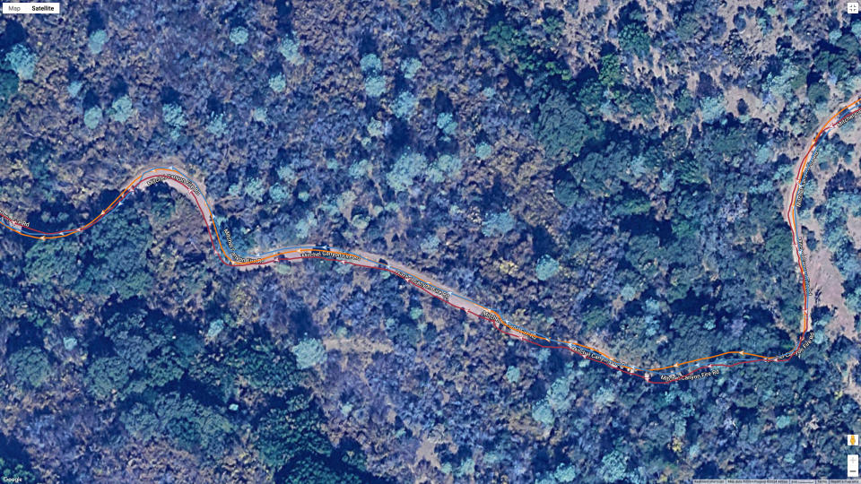 A GPS map of a hike from the COROS VERTIX 2S (orange line), Garmin Forerunner 965 (blue line), and Polar Vantage V3 (brown line).
