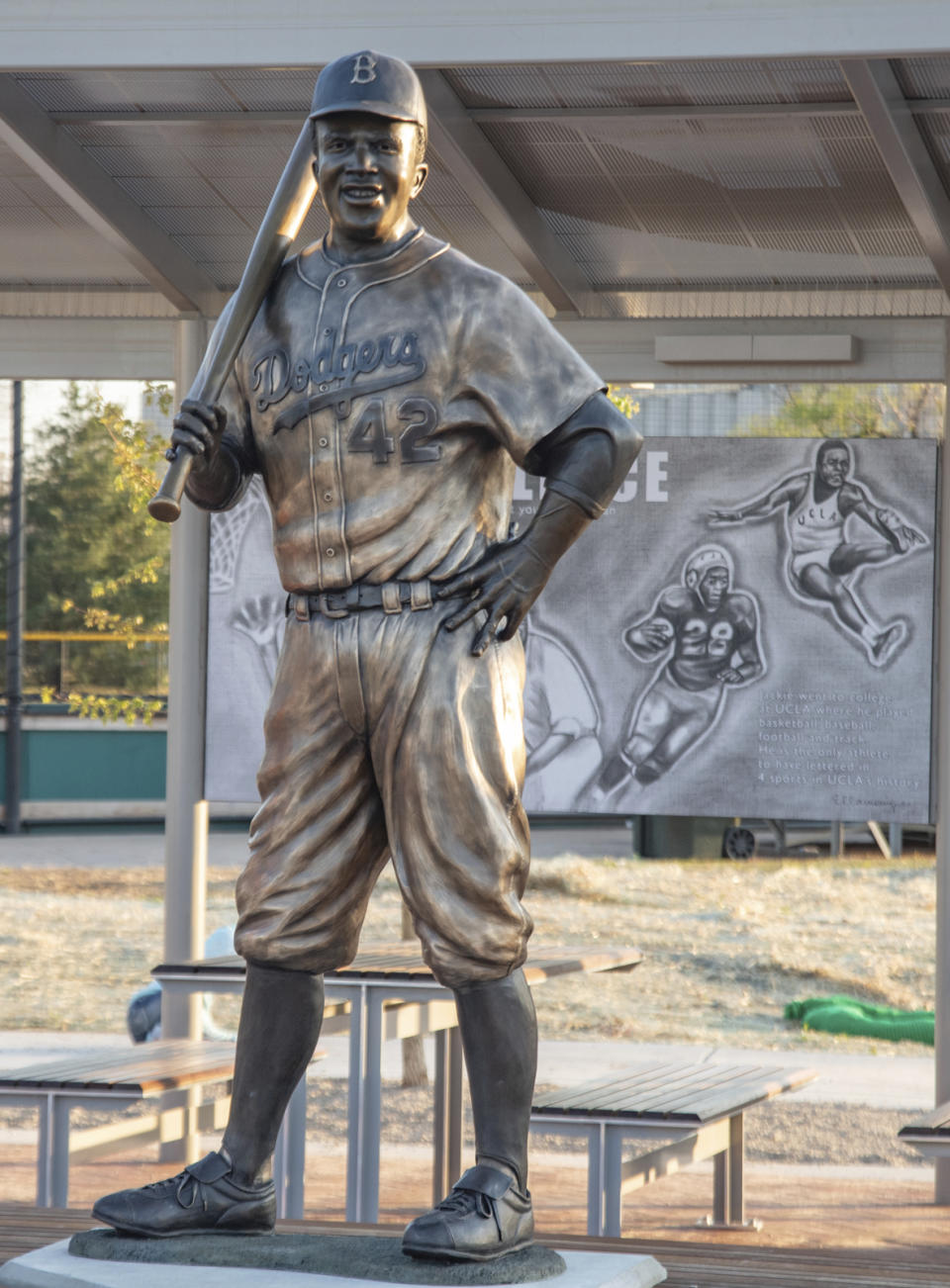 In this photo provided by Mel Gregory, a statue of baseball legend Jackie Robinson is seen Sunday, April 18, 2021, in Wichita, Kan. The bronze statue was cut down and stolen from this spot in a public park on Thursday, Jan. 25, 2024. (Mel Gregory via AP)