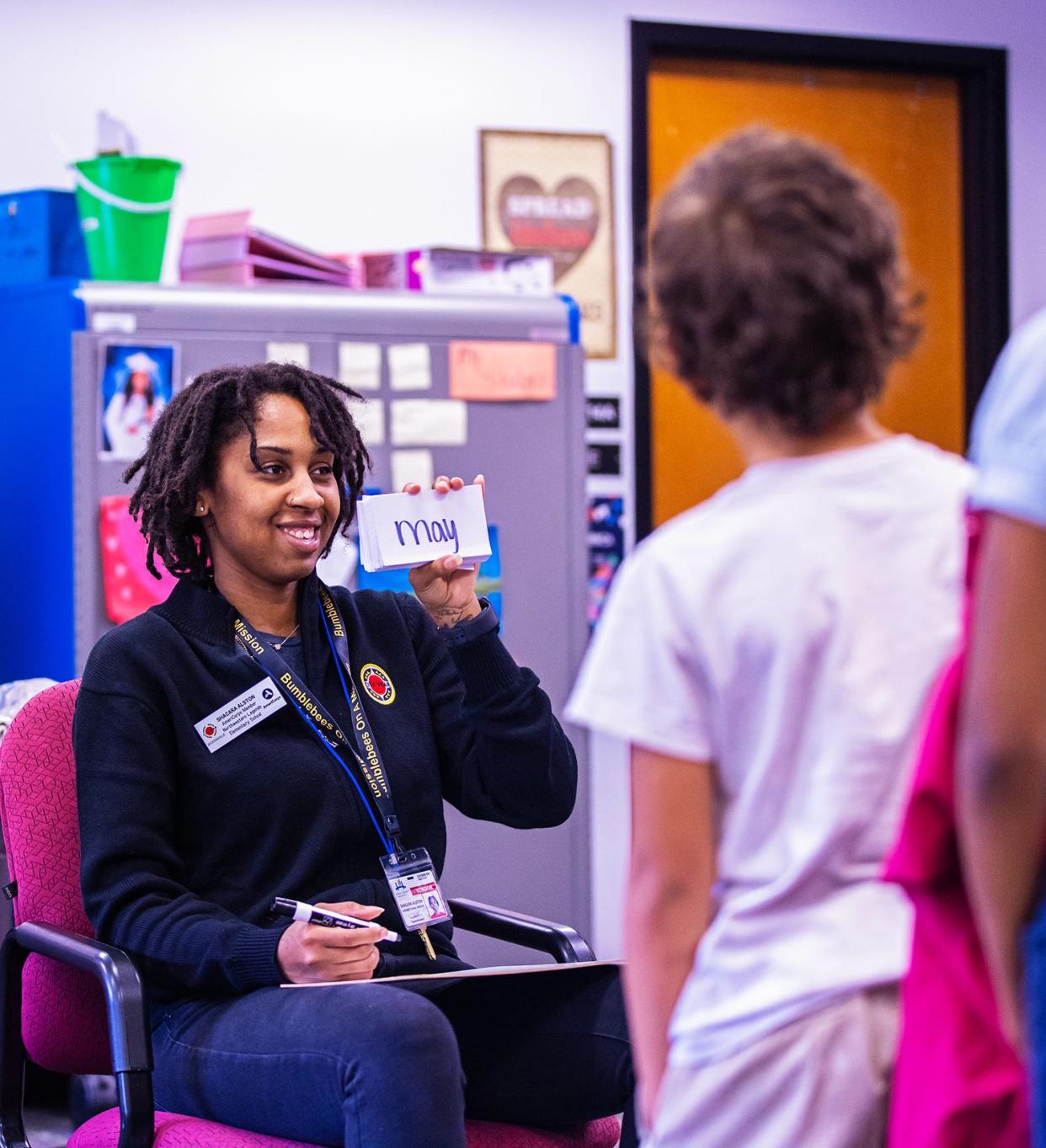 A City Year Jacksonville Student Success Coach works with youth.