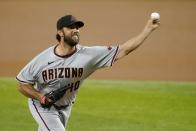 Arizona Diamondbacks starting pitcher Madison Bumgarner throws to a Texas Rangers batter during the first inning of a baseball game in Arlington, Texas, Wednesday, July 28, 2021. (AP Photo/Tony Gutierrez)