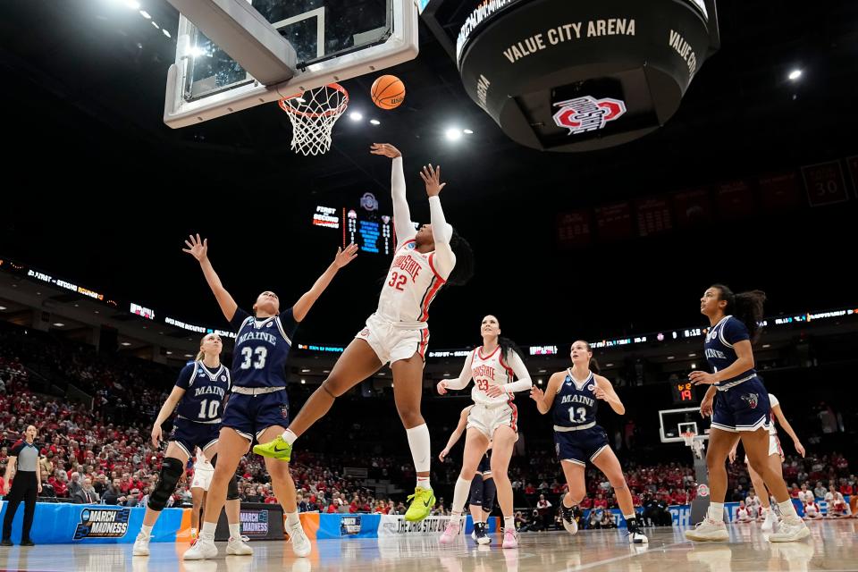 Mar 22, 2024; Columbus, OH, USA; Ohio State Buckeyes forward Cotie McMahon (32) shoots over Maine Black Bears forward Adrianna Smith (33) during the first half of the women’s basketball NCAA Tournament first round game at Value City Arena.