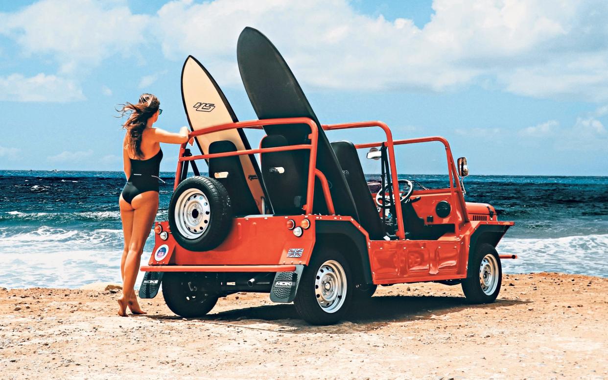 Gone surfing: the Moke looks great on the beach and can handle rainy days too - Moke International 