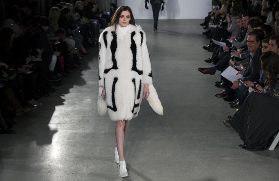 A model walks the runway at the presentation of the Altuzarra Fall 2013 fashion collection during Fashion Week, Saturday, Feb. 9, 2013, in New York. (AP Photo/Craig Ruttle)