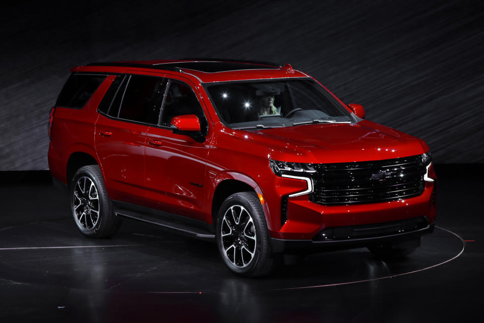 The 2021 Chevrolet Tahoe RST is unveiled in Detroit, Tuesday, Dec. 10, 2019. Global concerns about climate change are not stopping General Motors from making hulking SUVs for U.S. drivers. GM on Tuesday rolled out the next generation of its big truck-based SUVs with more space and features. (AP Photo/Paul Sancya)