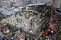 <p>A general view shows rescue workers searching for residents feared trapped in the rubble of a six-story building that collapsed after days of heavy rain, in Nairobi, Kenya, April 30, 2016. <i>(Photo: Stringer/Reuters)</i></p>