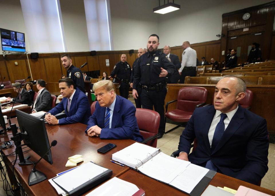 Donald Trump sits at the defense table in his hush money trial (AP)
