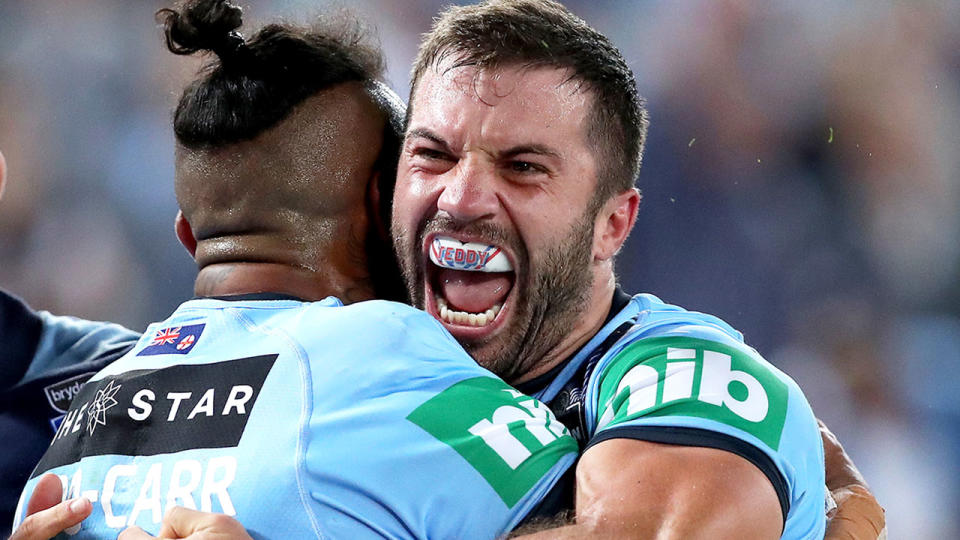 Pictured here, Josh Addo-Carr and James Tedesco embrace during State of Origin.