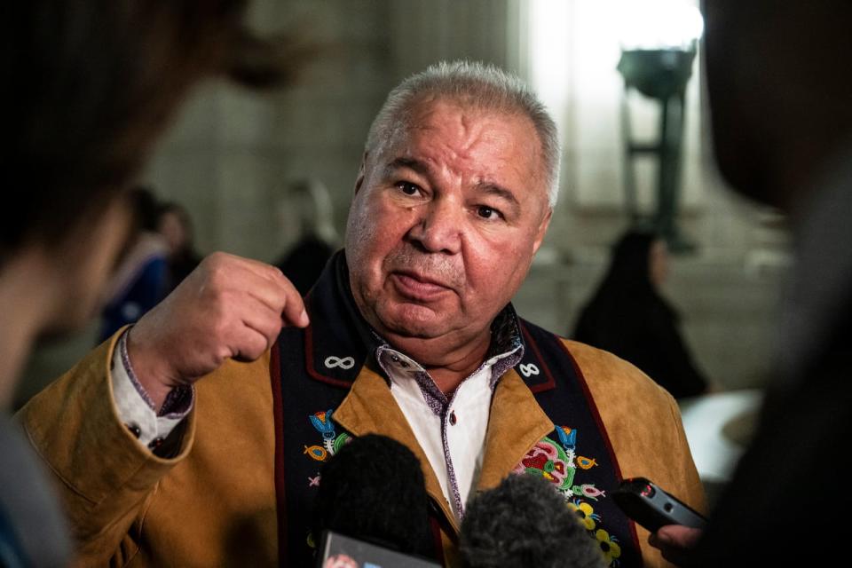 President of the Manitoba Metis Federation David Chartrand speaks to media after the completion of the 43rd Manitoba legislature throne speech at the Manitoba Legislative Building in Winnipeg on Nov. 21, 2023..