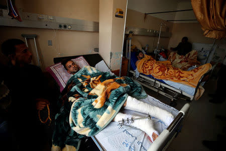 Palestinian who were wounded at the Israel-Gaza border lie on beds at al-Shifa hospital in Gaza City April 1, 2018. REUTERS/Mohammed Salem