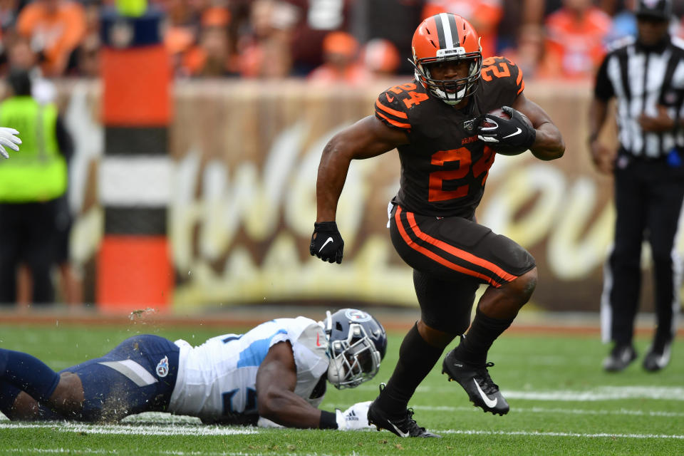 Nick Chubb #24 of the Cleveland Browns gets around the end for a gain in the second quarter against the Tennessee Titans at FirstEnergy Stadium on September 08, 2019 in Cleveland, Ohio . (Photo by Jamie Sabau/Getty Images)