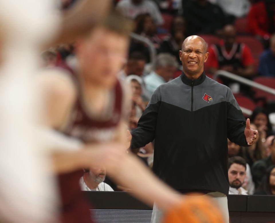 Louisville’s coach Kenny Payne lets his team know what to do against Bellarmine.Nov. 9, 2022