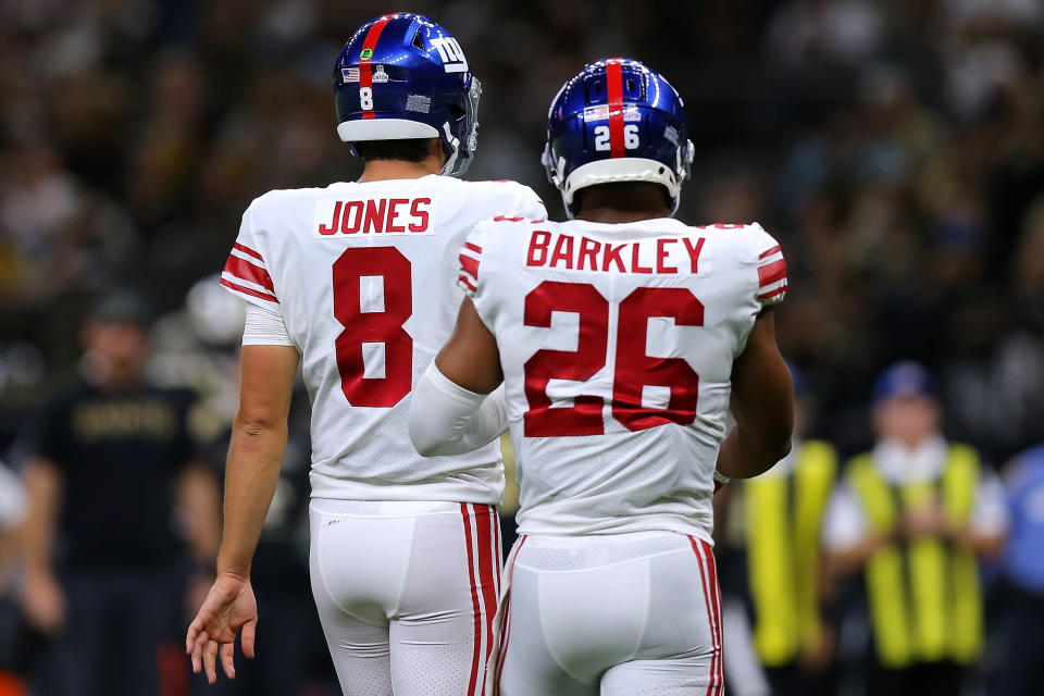 NEW ORLEANS, LOUISIANA - OCTOBER 03: Daniel Jones #8 of the New York Giants and Saquon Barkley #26 react against the New Orleans Saints during a game at the Caesars Superdome on October 03, 2021 in New Orleans, Louisiana. (Photo by Jonathan Bachman/Getty Images)