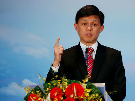 FILE PHOTO: Singapore's Minister Chan Chun Sing speaks before a MOU signing ceremony between Singapore Exchange Limited (SGX) and China Construction Bank Corp (CCB) in Singapore April 25, 2016. REUTERS/Edgar Su/File Photo