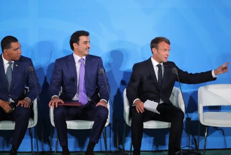 French President Macron, Qatar's Emir Al-Thani and Jamaican Prime Minister Holness attend the 2019 United Nations Climate Action Summit at U.N. headquarters in New York City, New York, U.S.