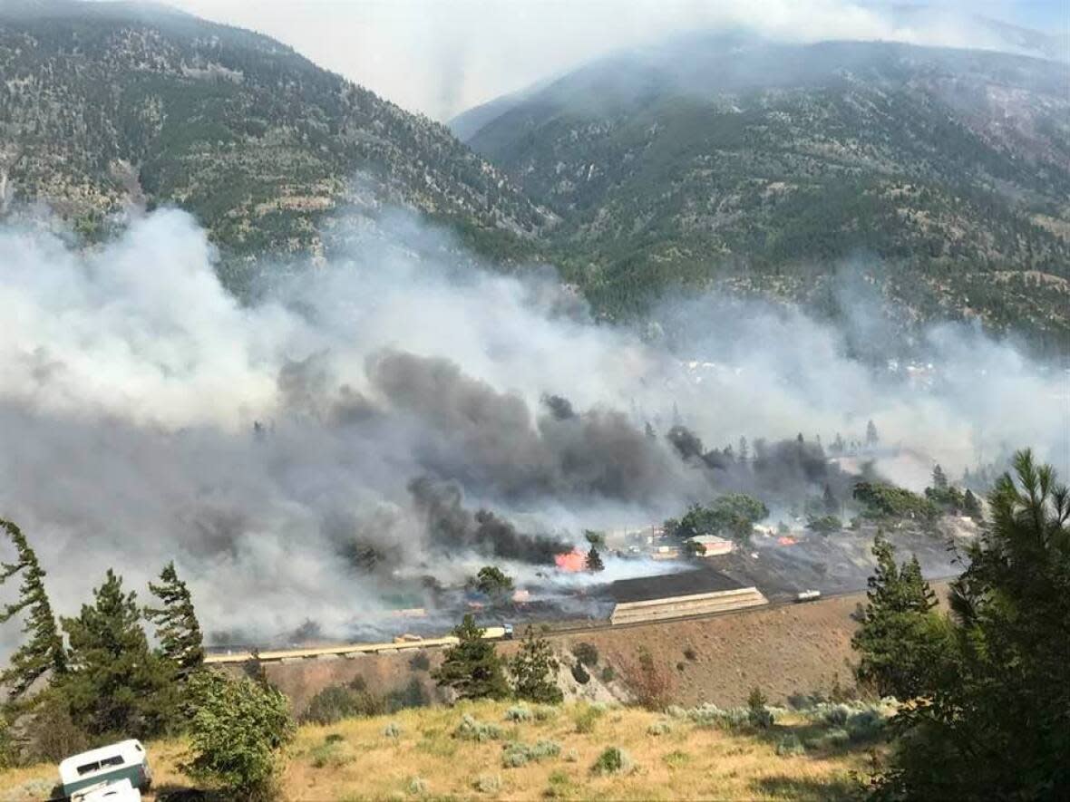At least 200 people fled their homes on a moment's notice after fast-moving wildfire tore through the community of Lytton in B.C.'s Fraser Valley. Conditions in the area were dangerously dry and windy after the summer's record-breaking heatwave. (Edith Loring-Kuhanga/Facebook - image credit)