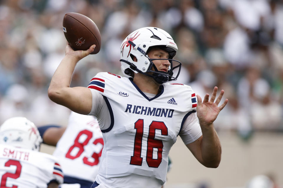 Richmond quarterback Kyle Wickersham throws against Michigan State during the first half of an NCAA college football game, Saturday, Sept. 9, 2023, in East Lansing, Mich. (AP Photo/Al Goldis)