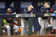 Los Angeles Dodgers right fielder Mookie Betts makes a catch and robs a home run from Atlanta Braves' Freddie Freeman during the fifth inning in Game 7 of a baseball National League Championship Series, Sunday, Oct. 18, 2020, in Arlington, Texas. (Curtis Compton/Atlanta Journal-Constitution via AP)