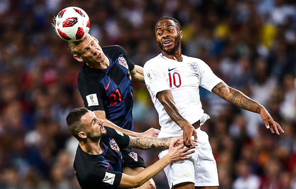 <p>Croatia’s Marcelo Brozovic, Domagoj Vida, and Englands Raheem Sterling (L-R) in their 2018 FIFA World Cup semi-final match at Luzhniki Stadium. Valery Sharifulin/TASS (Photo by Valery Sharifulin\TASS via Getty Images) </p>