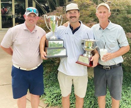 Golf can be a family tradition, as in the case of the Curd clan — sons Austin, left, and Landon, center, and dad Jim Curd. Last weekend, Landon joined his dad in winning a Bartlesville City Men's Golf Championship tourney title. Tying the close threesome together in the links realm is grandpa/dad Jim Curd Sr., who more than 30 years ago helped put the wind under the sails of the city tournament and kept promoting it until his passing in 2017. The tourney is named in Curd Sr's honor, which made Landon's victory doubly sweet. Landon holds the take-home personal trophy and the perpetual trophy that lists all the winners' names.