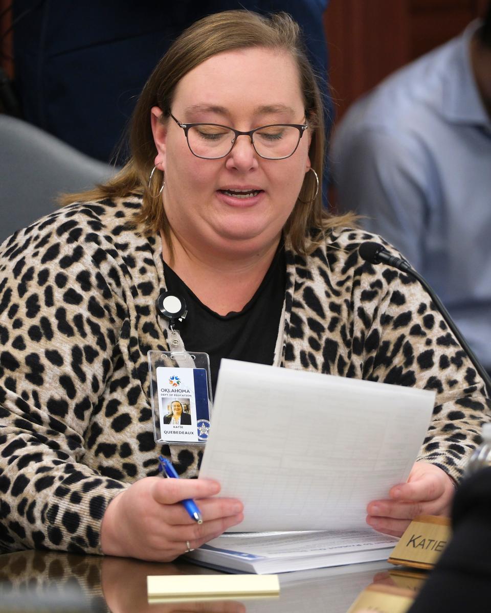 Board member Katie Quebedeaux reads a motion during a special meeting Thursday of the state Board of Education to consider revoking the license of a teacher from the Western Heights school district.