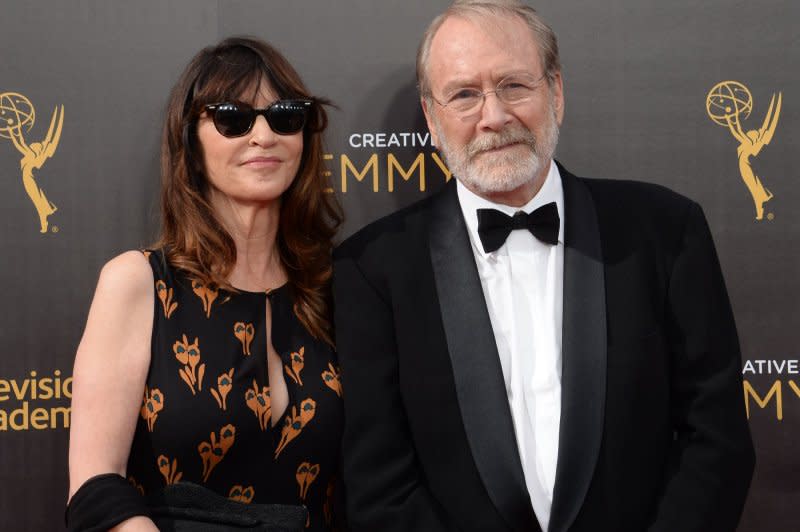 Martin Mull -- seen here with a guest attending the 2016 Creative Arts Emmy Awards at Microsoft Theater in Los Angeles -- has died at the age of 80. File Photo by Jim Ruymen/UPI