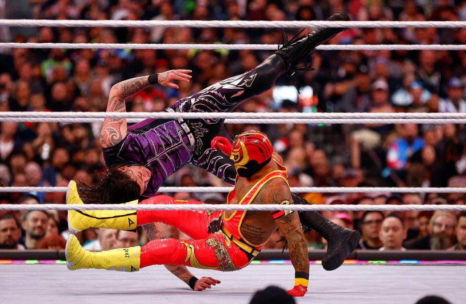 INGLEWOOD, CALIFORNIA - APRIL 01:  Dominik Mysterio, top wrestles Rey Mysterio during WrestleMania Goes Hollywood at SoFi Stadium on April 01, 2023 in Inglewood, California. (Photo by Ronald Martinez/Getty Images) ORG XMIT: 775959719 ORIG FILE ID: 1478899724