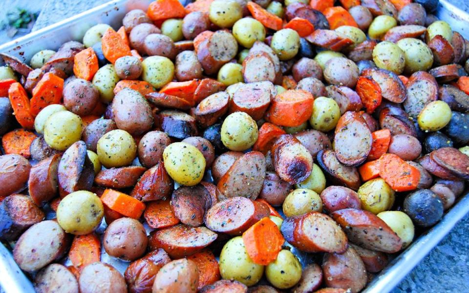 <p>Krista Marshall</p><p>This one-pan meal basically cooks itself. It's also incredibly versatile; swap the potatoes and carrots for your favorite veggies.</p><p><strong>Get the recipe: <a href="https://parade.com/842780/kristamarshall/sausage-potato-sheet-pan-dinner/" rel="nofollow noopener" target="_blank" data-ylk="slk:Sausage & Potato Sheet-Pan Dinner;elm:context_link;itc:0;sec:content-canvas" class="link ">Sausage & Potato Sheet-Pan Dinner</a></strong></p>
