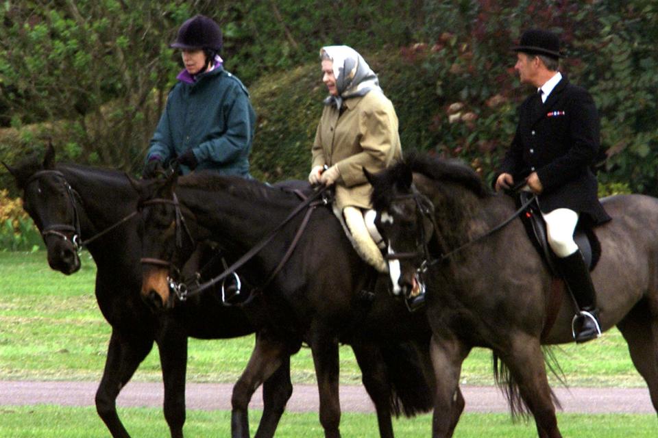 The Queen and her daughter Anne, the Princess Royal, ride happily side-by-side (PA)