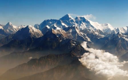 FILE PHOTO: Mount Everest and other peaks of the Himalayan range are seen from air during a mountain flight from Kathmandu