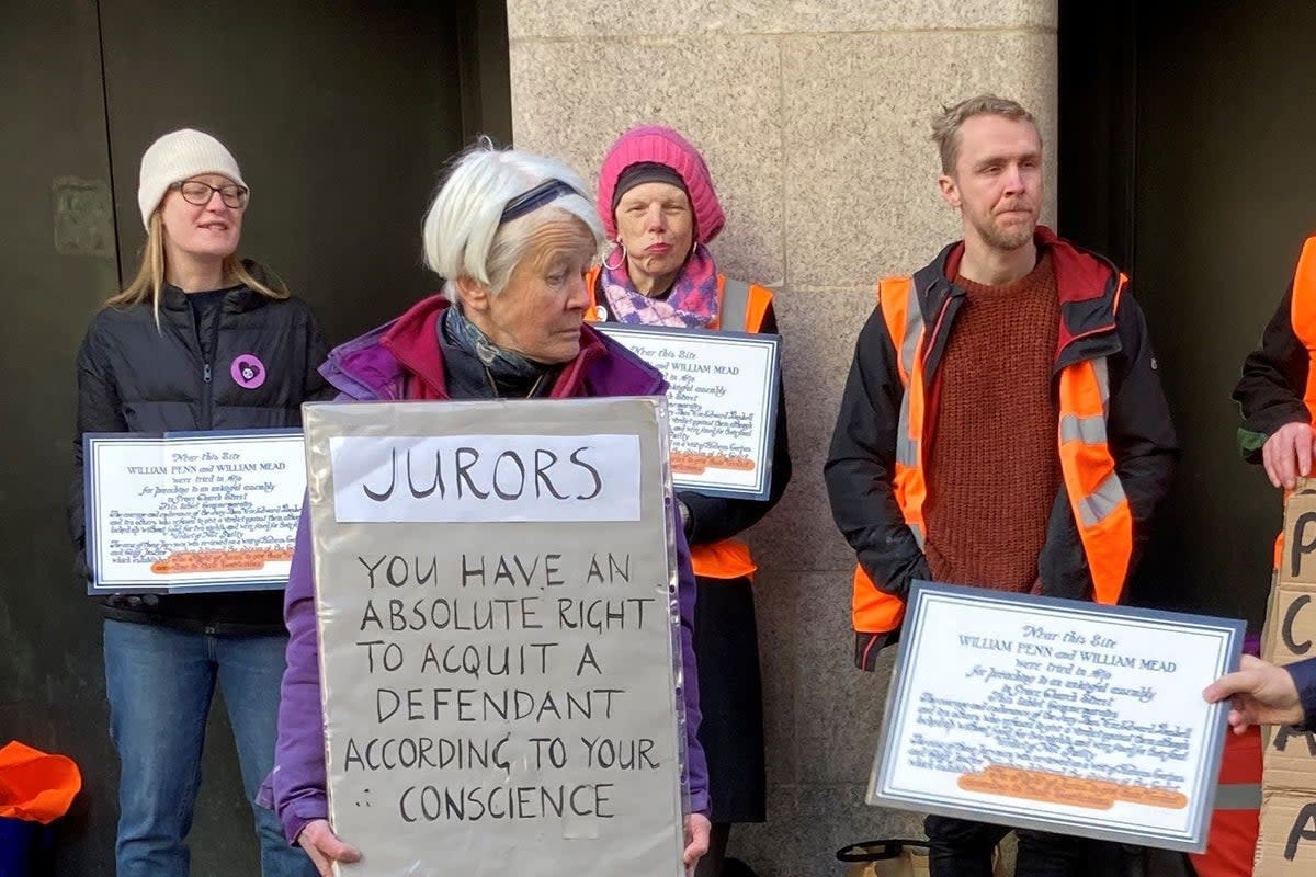 Trudi Warner, a 69-year-old climate change activist, is facing legal proceedings for allegedly holding up a sign in front of jurors  (PA Wire)