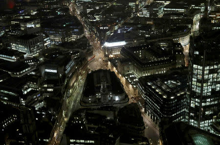 FILE PHOTO: A general view of Threadneedle Street and the Bank of England in the City of London at night November 14, 2016. REUTERS/Kevin Coombs/File Photo