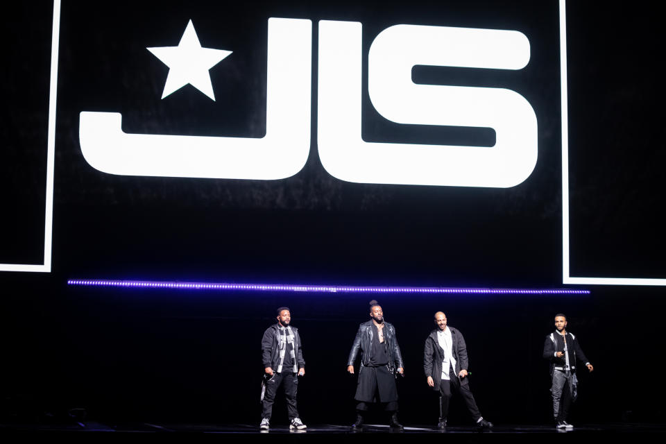 LEEDS, ENGLAND - OCTOBER 30: (EDITORIAL USE ONLY) Aston Merrygold, Oritsé Williams, Marvin Humes, and JB Gill of JLS perform at First Direct Arena on October 30, 2021 in Leeds, England. (Photo by Andrew Benge/Redferns)