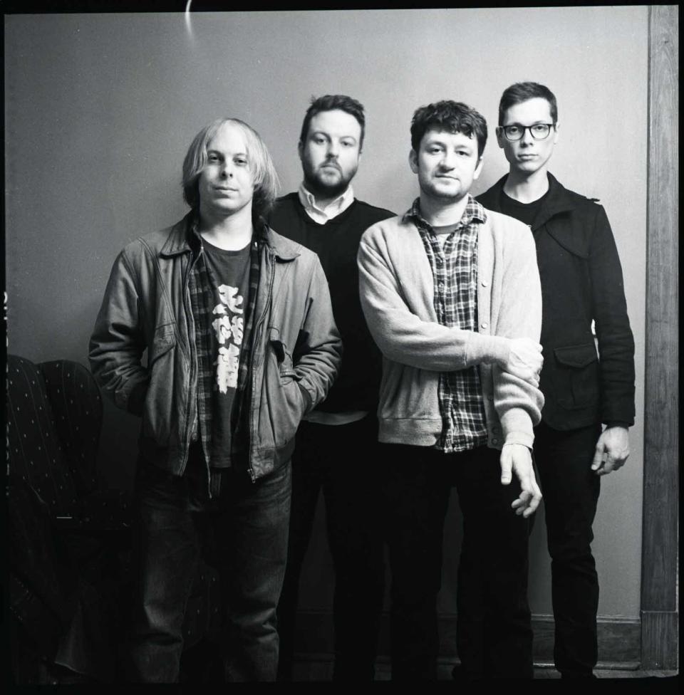 Indie rockers Someone Still Loves You Boris Yeltsin include Phil Dickey, third from left, who is also a collaborator on Dragon Inn 3, an '80s-style band.