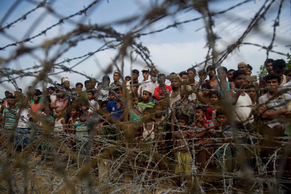 Rohingya refugees gather in 'no man's land’ behind Myanmar's borderAFP/Getty