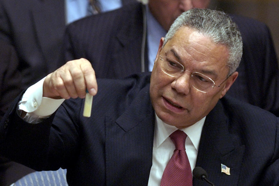 FILE - This photo by Associated Press photographer Elise Amendola shows US Secretary of State Colin Powell holding a vial of what he said could have been a biological weapon during a meeting on the invasion of Iraq in the United Nations Security Council on Wednesday, Feb. 5, 2003. Amendola, who recently retired from the AP, died Thursday, May 11, 2023, at her home in North Andover, Mass., after a 13-year battle with ovarian cancer. She was 70. (AP Photo/Elise Amendola, File)