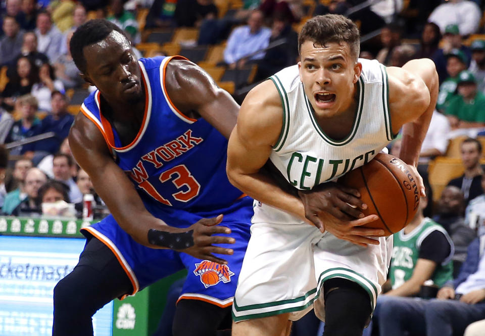 Oct 22, 2015; Boston, MA, USA; New York Knicks guard Jerian Grant (13) tries to steal the ball from Boston Celtics guard R.J. Hunter (28) during the second half of the Boston Celtics’ 99-85 win over the New York Knicks at TD Garden. Winslow Townson-USA TODAY Sports